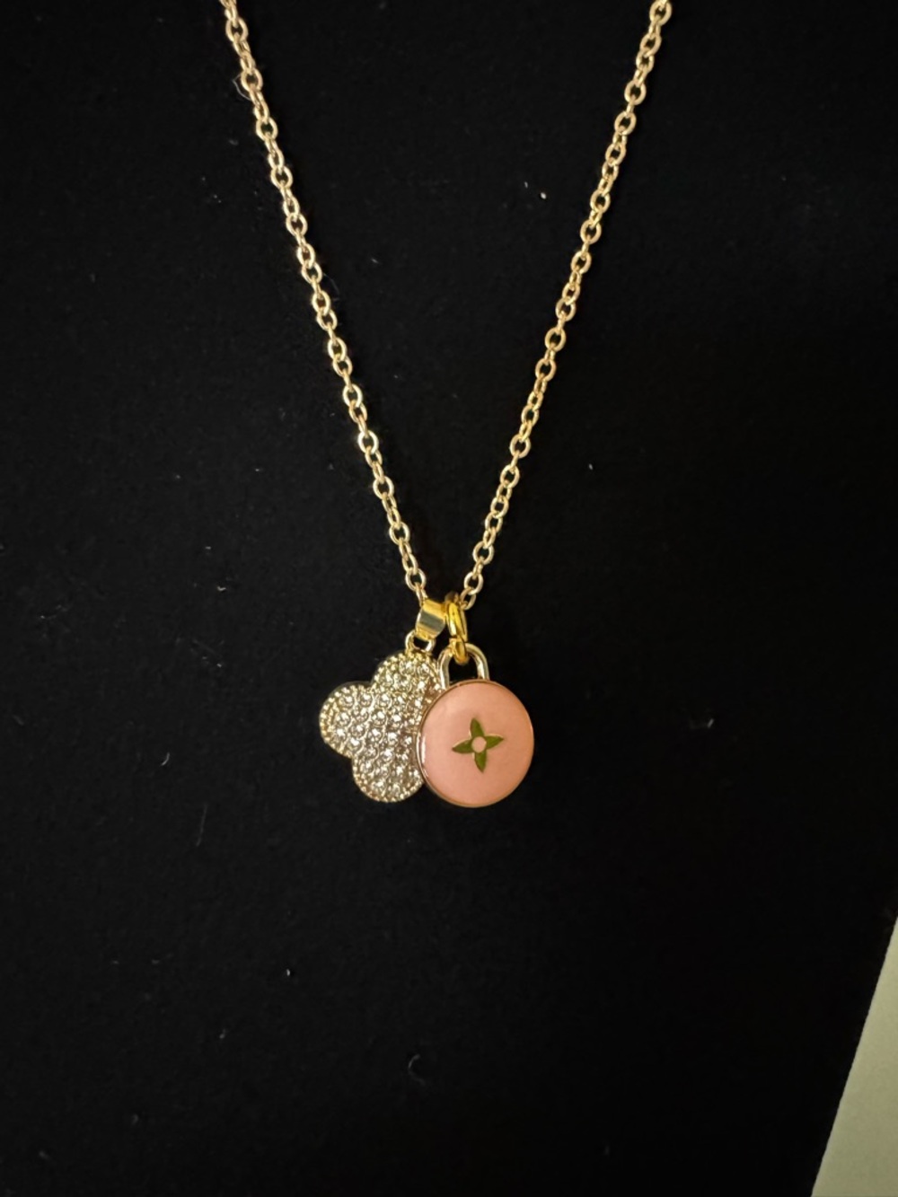 Gold Necklace with Pink Charm and Sparkling Clover Pendant
